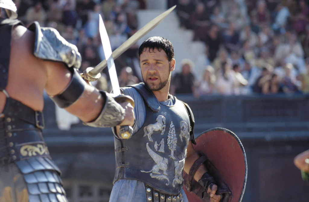 Russel Crowe em uma cena de batalha de Gladiador (2000).