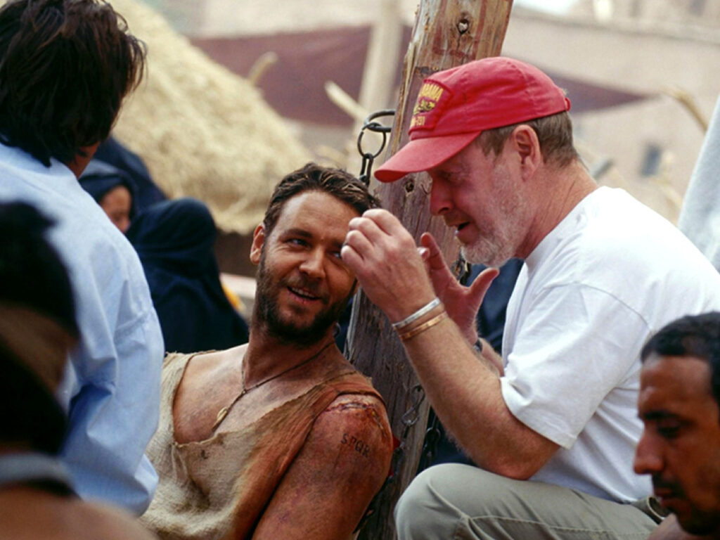 Ridley Scott e Russel Crowe durante as filmagens de Gladiador (2000).