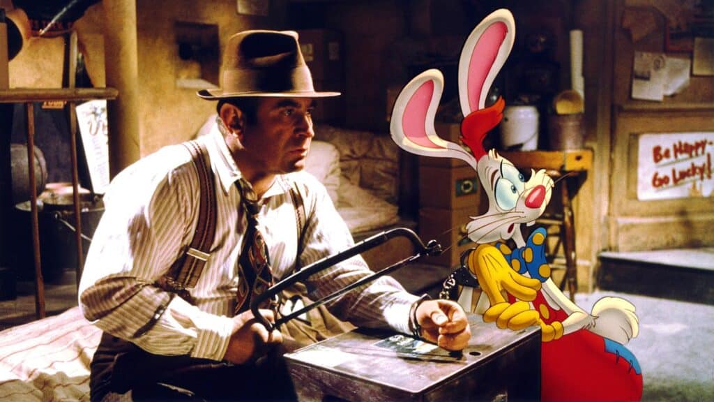 Bob Hoskins e Roger Rabbit em cena de Uma Cilada para Roger Rabbit (1988).