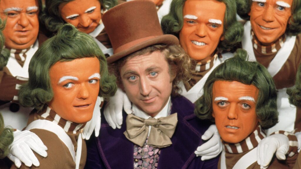 Willy Wonka e os Oompa-Loompas em A Fantástica Fábrica de Chocolate (1971).