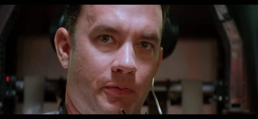 Tom Hanks interpretando Jim Lovell no filme Apollo 13