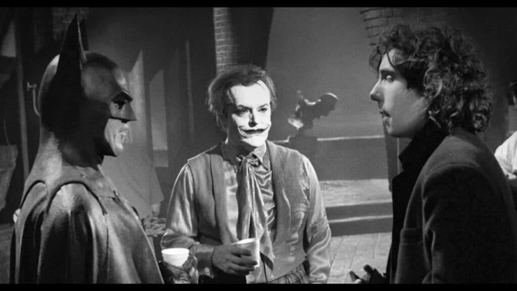 Jack Nicholson, Michael Keaton e o diretor Tim Burton durante as filmagens de Batman (1989).