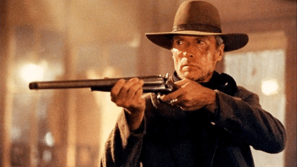 William Munny (Clint Eastwood) em uma das cenas finais de Os Imperdoáveis. Distribuição: Warner Bros.