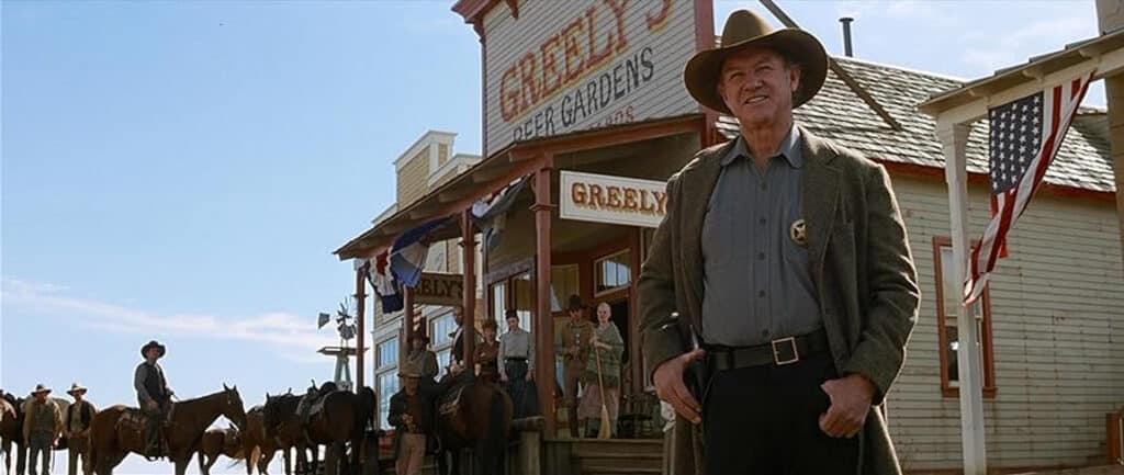 Gene Hackman, como o Xerife "Little" Bill Daggett em cena de Os Imperdoáveis. Distribuição: Warner Bros.