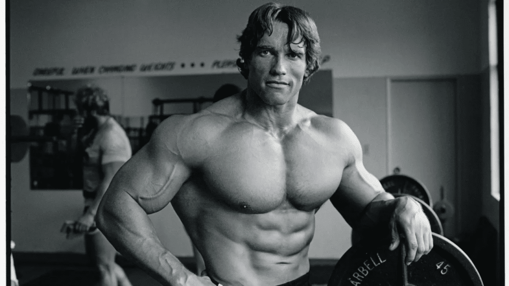 Arnold Schwarzenegger nos anos 1970. Créditos: Pumping Iron.