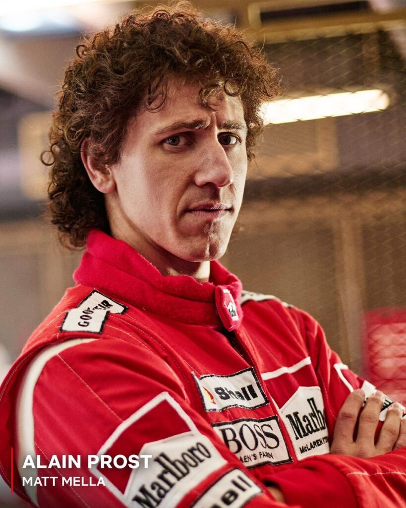 Matt Mella como campeão Alain Prost, rival de Senna